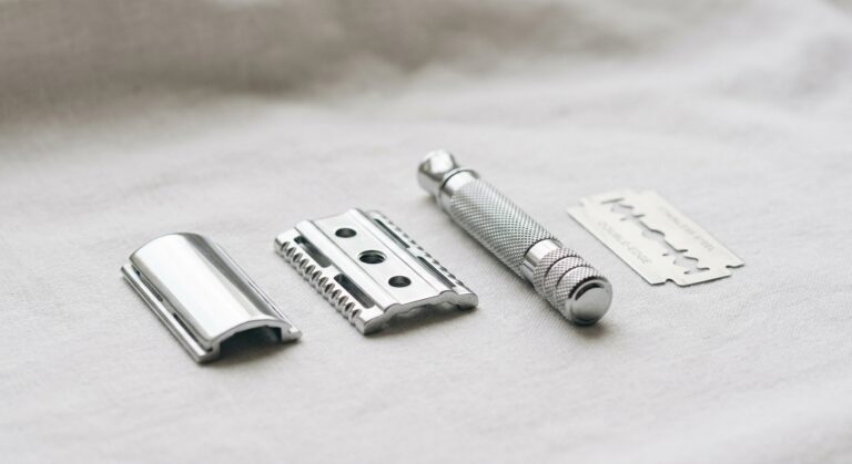 Safety razor parts: handle, base plate, cap, and blade